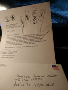 letter to Governor Abbott from Nancy Crowther with her hand drawn on it she wrote LOVE US GLOVE US, one word in each finger.  